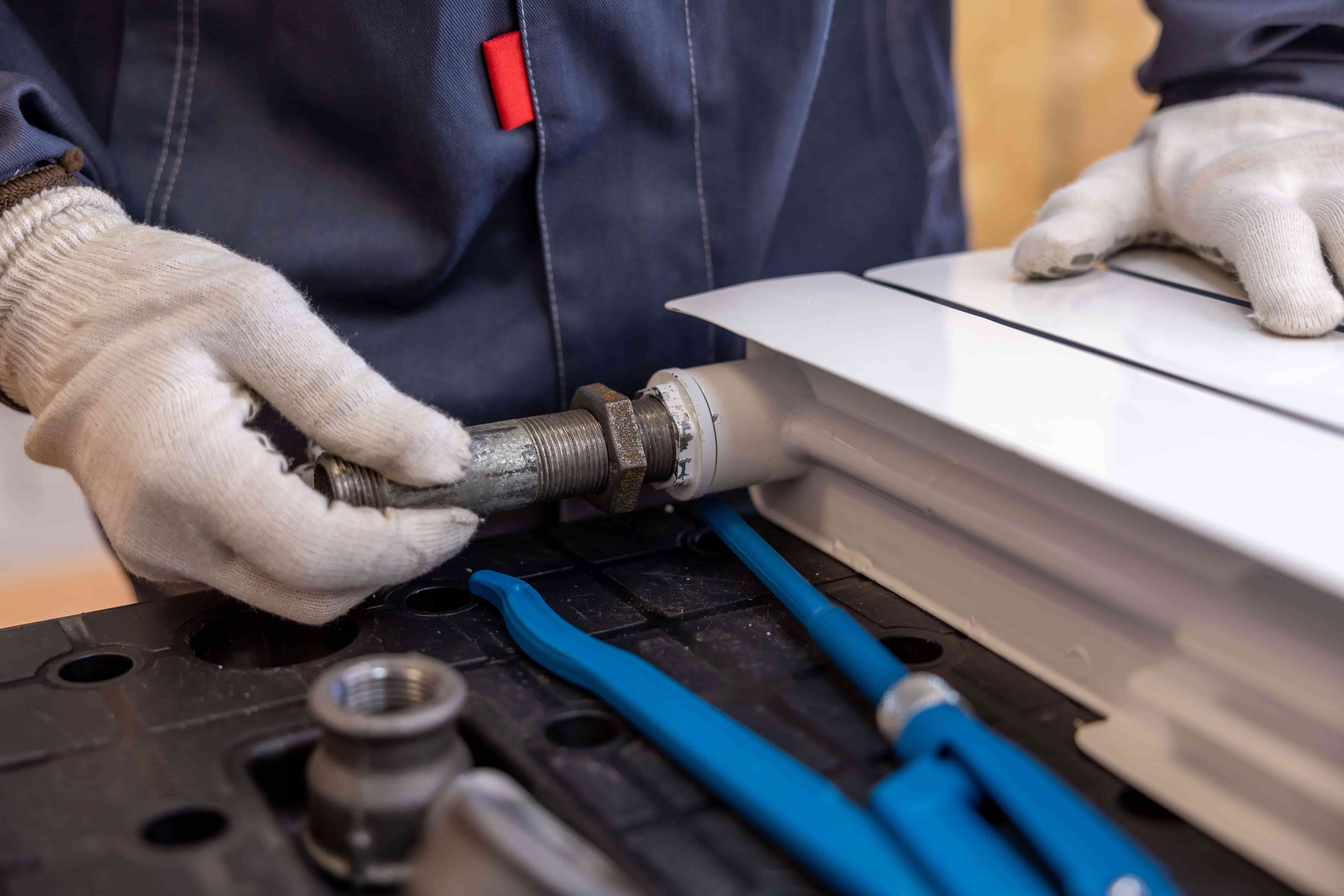 Plumbing tools and pipe wrenches used for residential plumbing repair